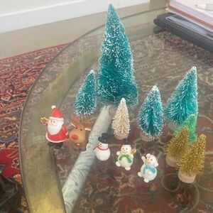 Set of brush trees and celluloid figures. Santa snowmen reindeer